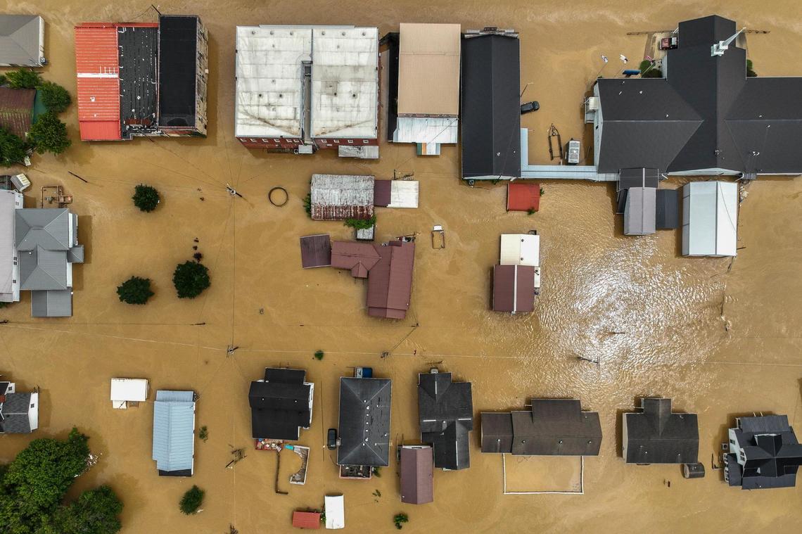 Buildings and roads are flooded in Garrett, Ky., on Thursday, July 28, 2022.