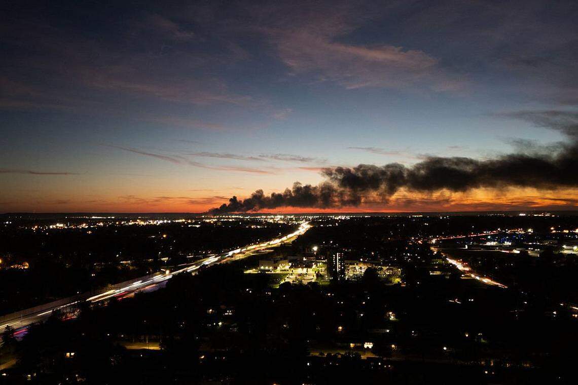 Smoke rises from the site of a UPS cargo plane crash near the UPS Worldport at Louisville Muhammad Ali International Airport in Louisville, Kentucky, on November 4, 2025. A UPS cargo plane crashed on the evening of November 11 near the Louisville International Airport shortly after takeoff, the US Federal Aviation Administration (FAA) said, as local media in the Kentucky city aired video of a large plume of smoke rising above the facility."UPS Flight 2976 crashed around 5:15 p.m. local time," the FAA said, identifying the aircraft as a McDonnell Douglas MD-11 headed to Hawaii. (Photo by LEANDRO LOZADA / AFP) (Photo by LEANDRO LOZADA/AFP via Getty Images)          