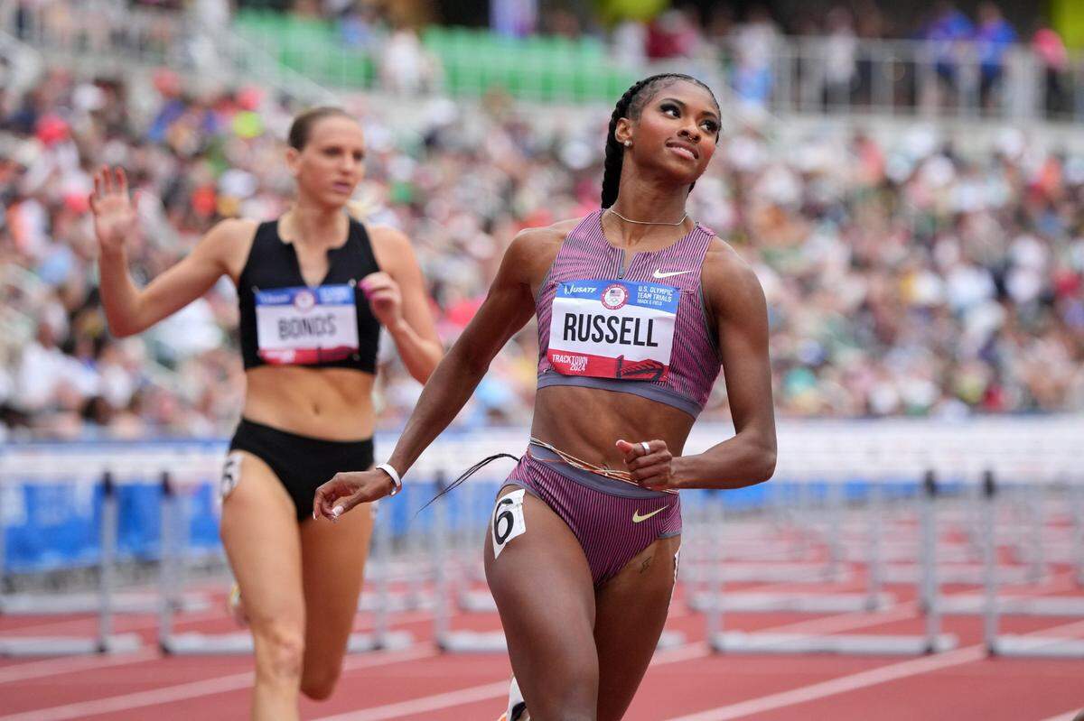 Former Kentucky Wildcats star Masai Russell won the women’s 100-meter hurdles at the U.S. Olympic Trials with a world’s-best time of 12.25 seconds.
