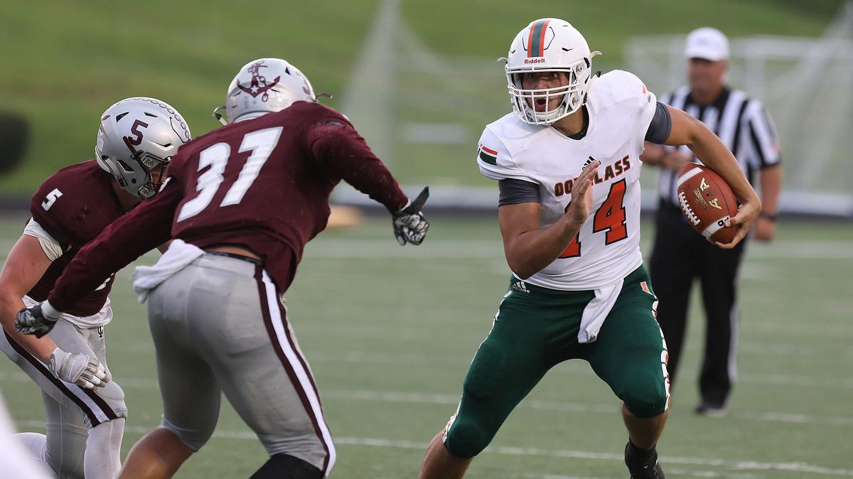 Frederick Douglass quarterback Cameron Jones looked for room on the keeper against Tates Creek on Friday, Aug. 24, 2018.