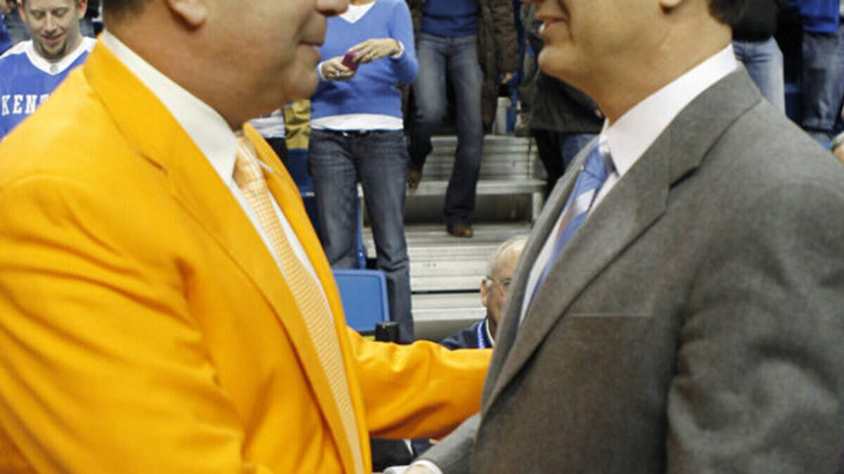 Kentucky Coach John Calipari shook hands with University of Tennessee Coach Bruce Pearl, who returned Tuesday night from an eight-game suspension in the game against UK at Rupp Arena.
