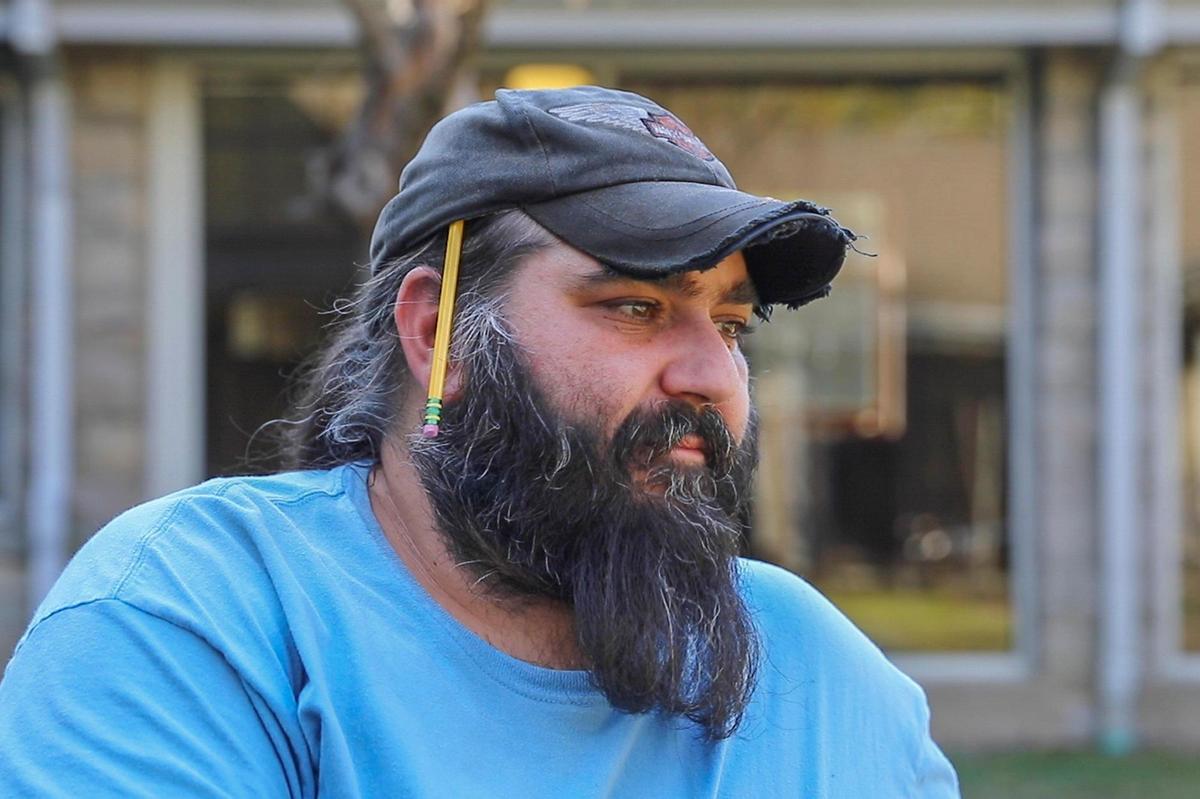 Nathan Smith talks about his experience working for Troublesome Creek Stringed Instrument Company in Hindman, Ky., Wednesday, Oct. 9, 2019.