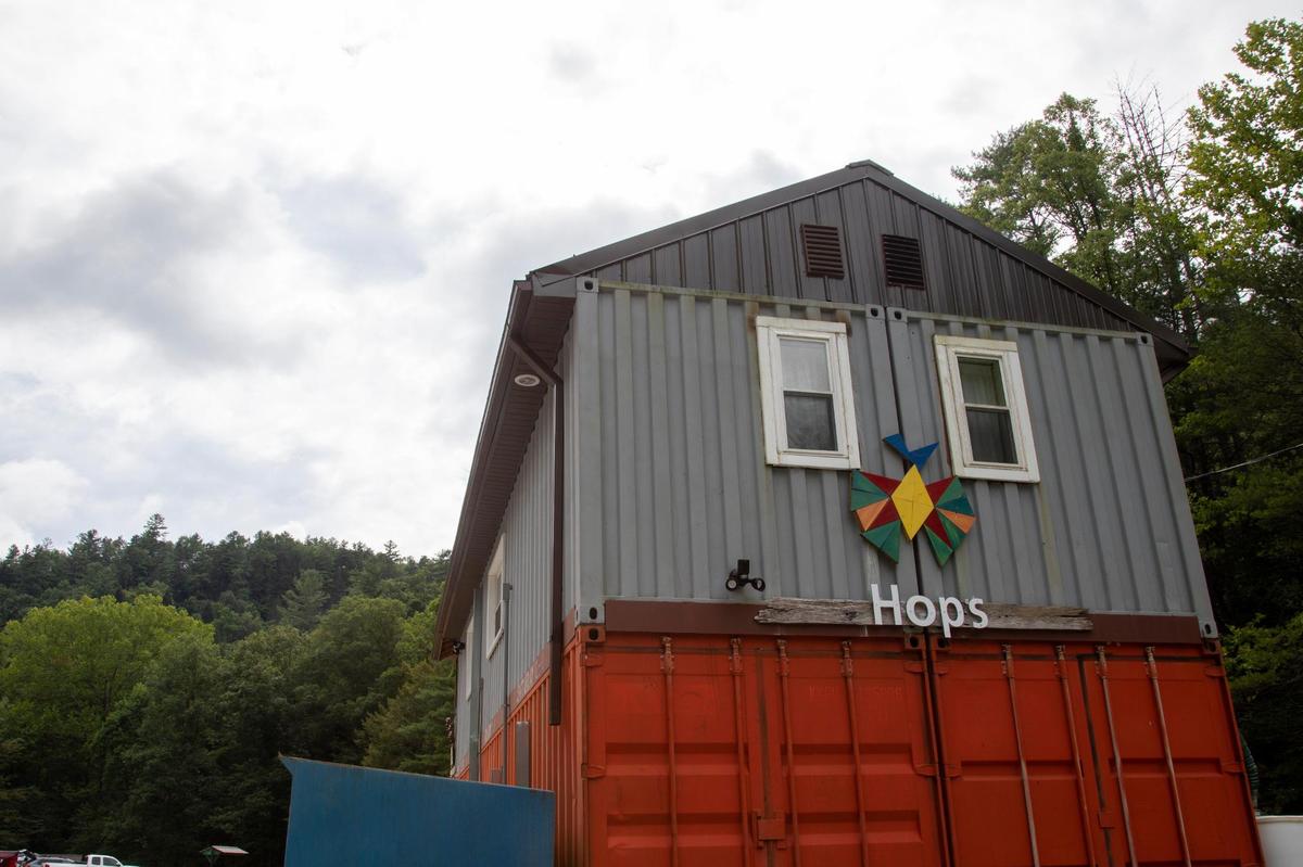 The structure of Hop’s Beer Garden and Restaurant is made with recycled shipping containers, fitting in line with owner April Reefer’s wish to reduce their environmental impact.