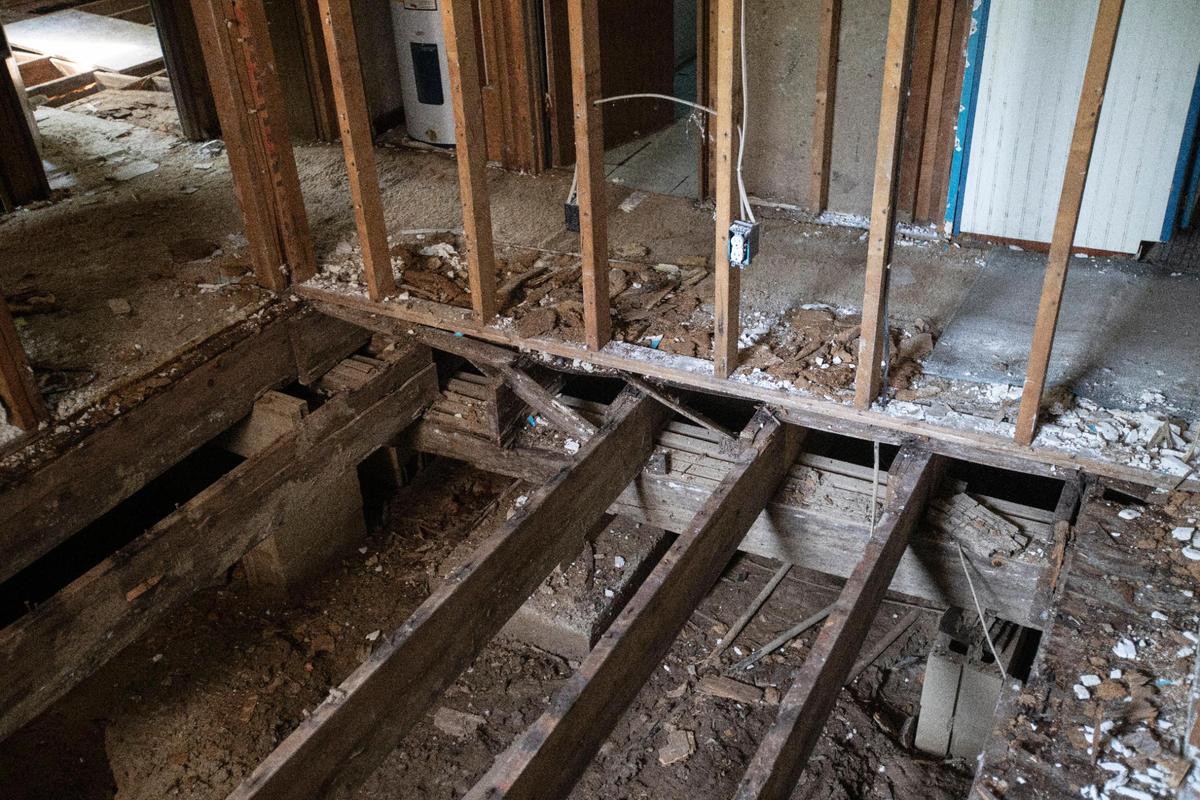 An exposed support beam in Cody RiceÕs family home is exposed after the flooding in Clay City on Thursday, May 27, 2021. According to Cody the water got up to five feet inside the house and picked it up off the foundation, breaking the main support beam and caving in part of the ceiling.