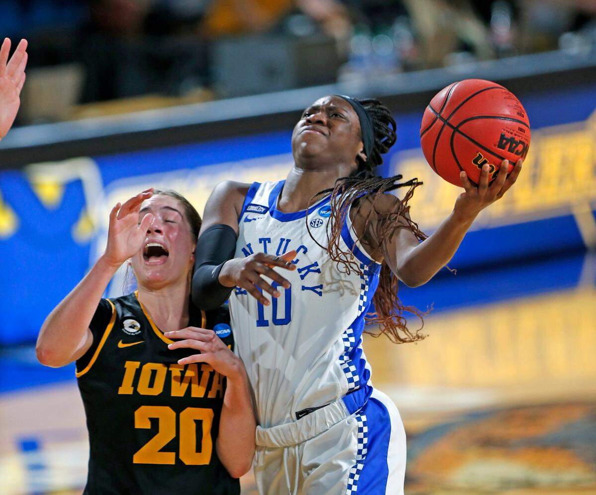 Kentucky’s Rhyne Howard (10) drives past Iowa’s Kate Martin (20) during last season’s NCAA Tournament. Kentucky has never advanced past the second round of the tourney with Howard on the team.