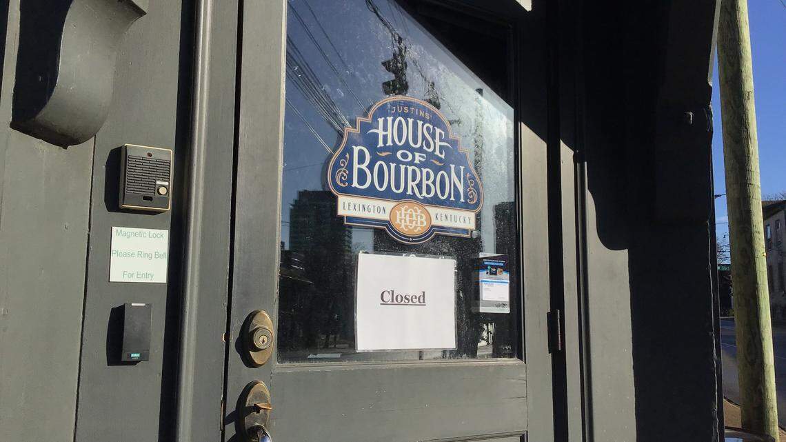 A closed sign on the front door of Justins’ House of Bourbon at 601 West Main St. in downtown Lexington, photographed Jan. 19, 2023. The vintage liquor was raided by the ABC after “complaints alleging several violations associated with Justin’s House of Bourbon for the improper acquisition, possession, transport, and sale of bourbon, including Vintage Distilled Spirits.”