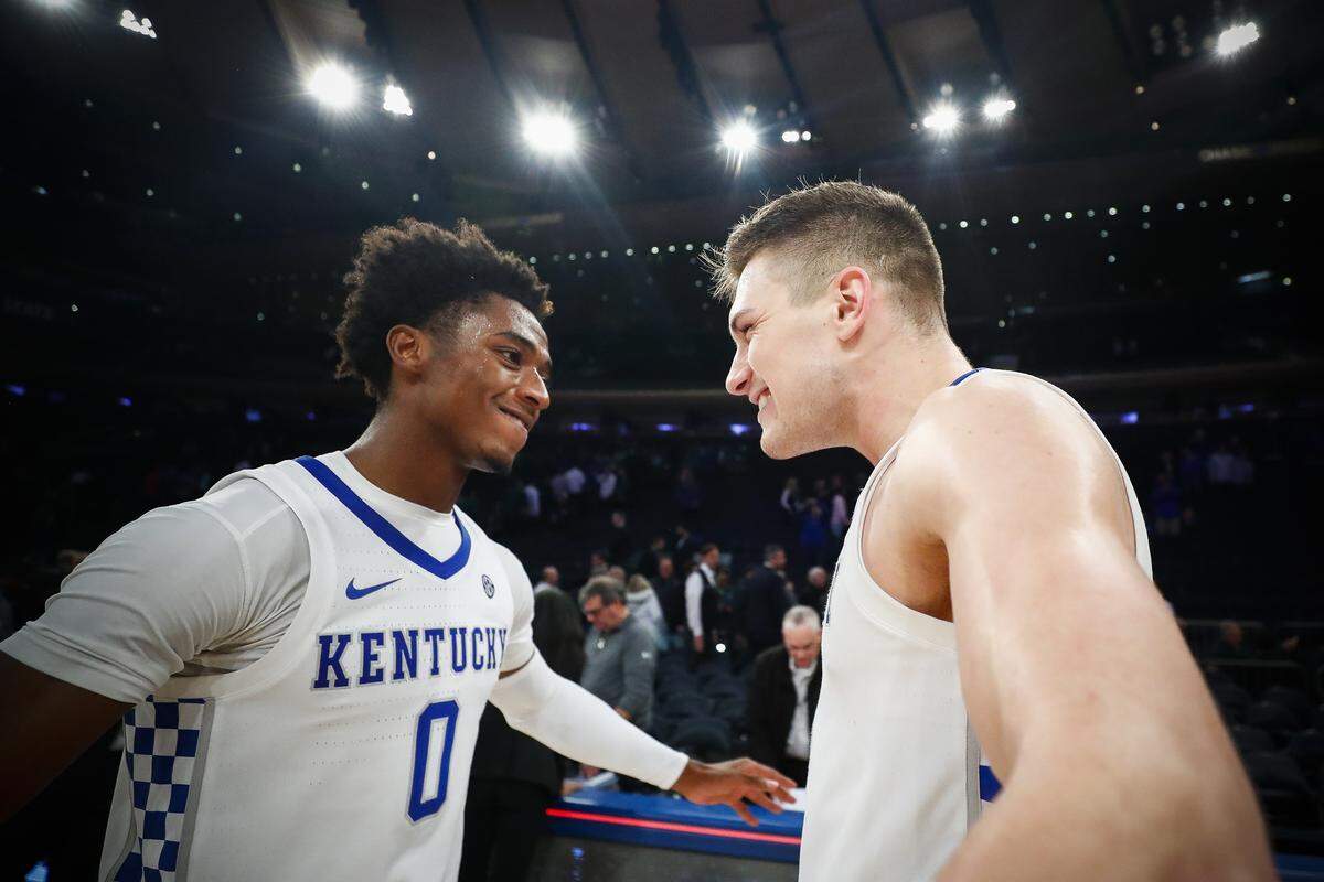 Ashton Hagans, left, and Nate Sestina celebrated after Kentucky knocked off No. 1 Michigan State in the Champions Classic.