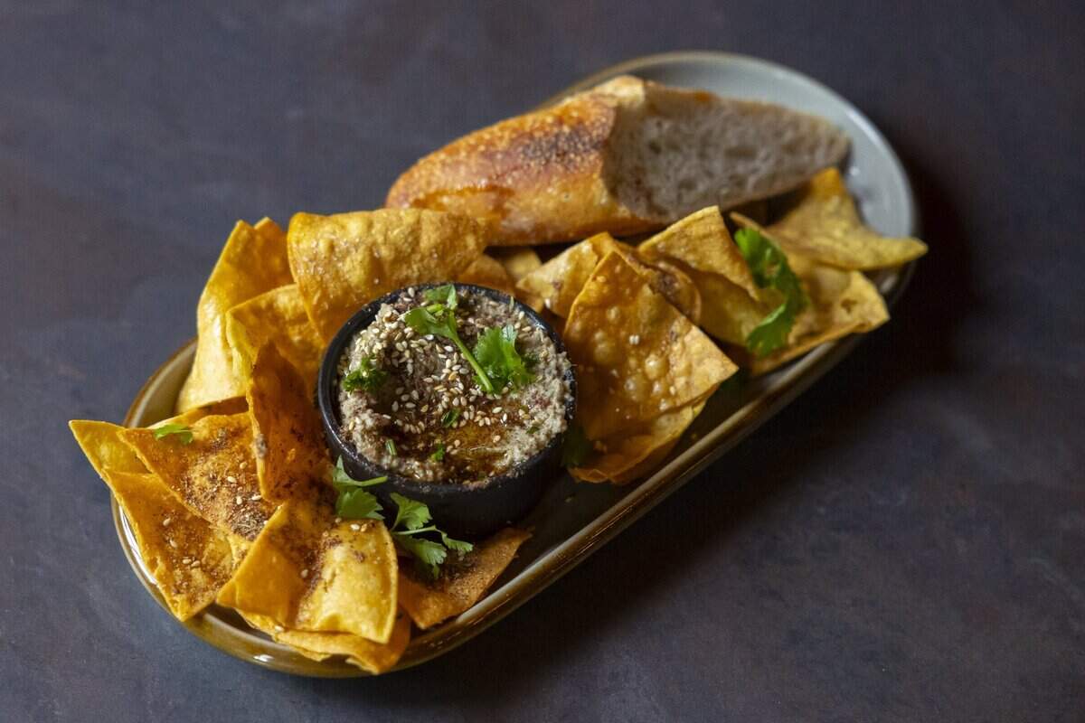 Baba ghanoush and chips are photographed at Mulberry Street Bar & Kitchen in Lexington, Ky., on Wednesday, July 8, 2026.