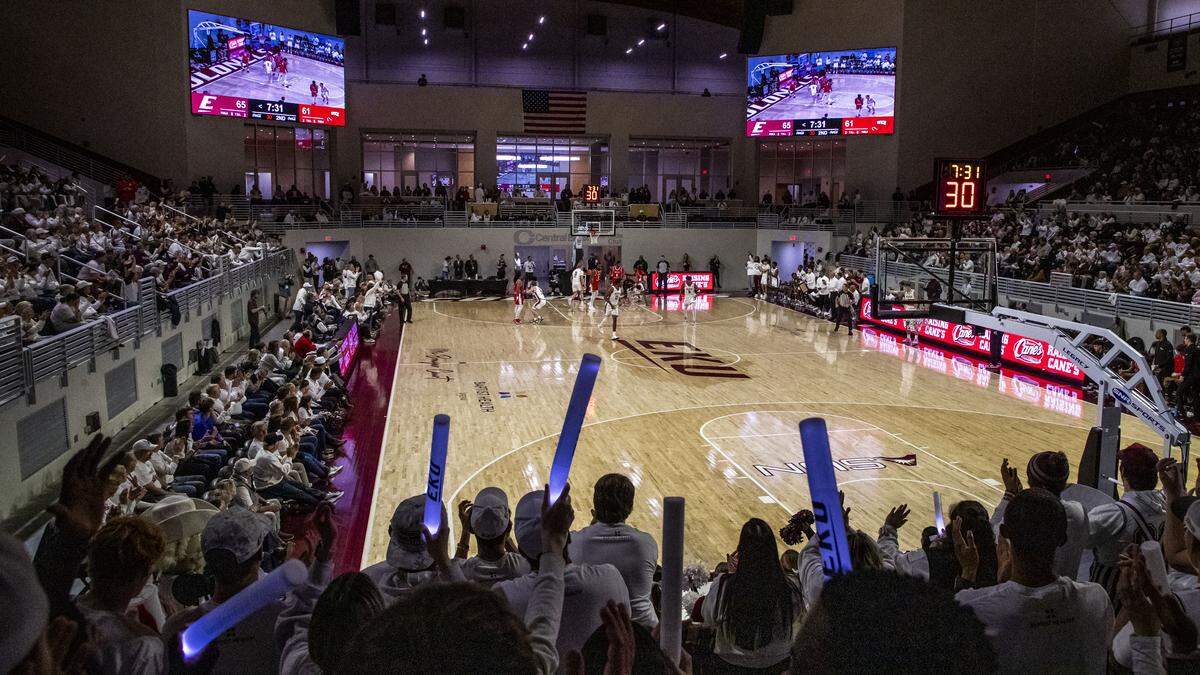 Fans cheer an Eastern Kentucky basket during the Colonels’ 87-79 loss to Western Kentucky on Monday, Nov. 10, 2025, at Baptist Health Arena at Alumni Coliseum in Richmond, Ky. The in-state rivalry game was the first inside the fully renovated arena.