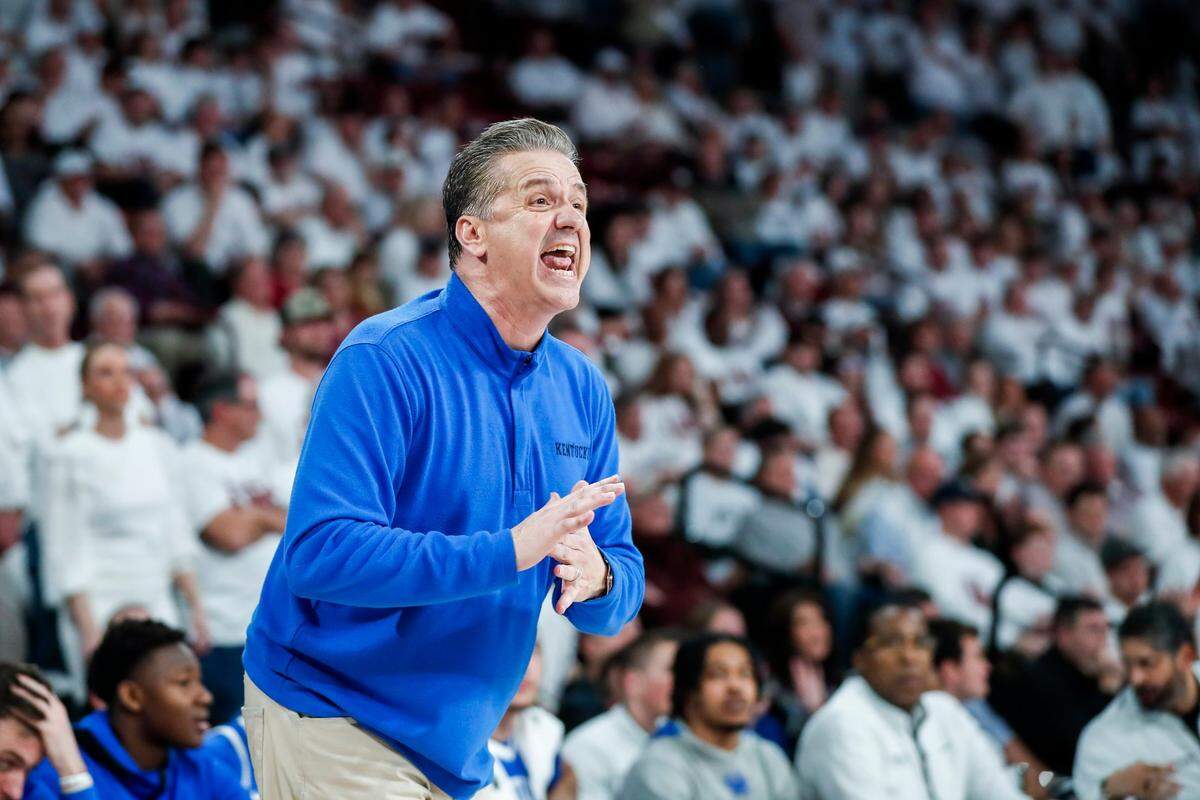 Kentucky Wildcats head coach John Calipari calls to his players to call a timeout in the final possessions of the game against the Mississippi State Bulldogs during the game at Humphrey Coliseum in Starkville, Ms., Wednesday, February 15, 2023.
