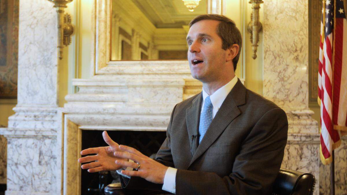 Gov.-elect Andy Beshear speaks with a reporter in the Kentucky Capitol on Dec. 5, 2019.