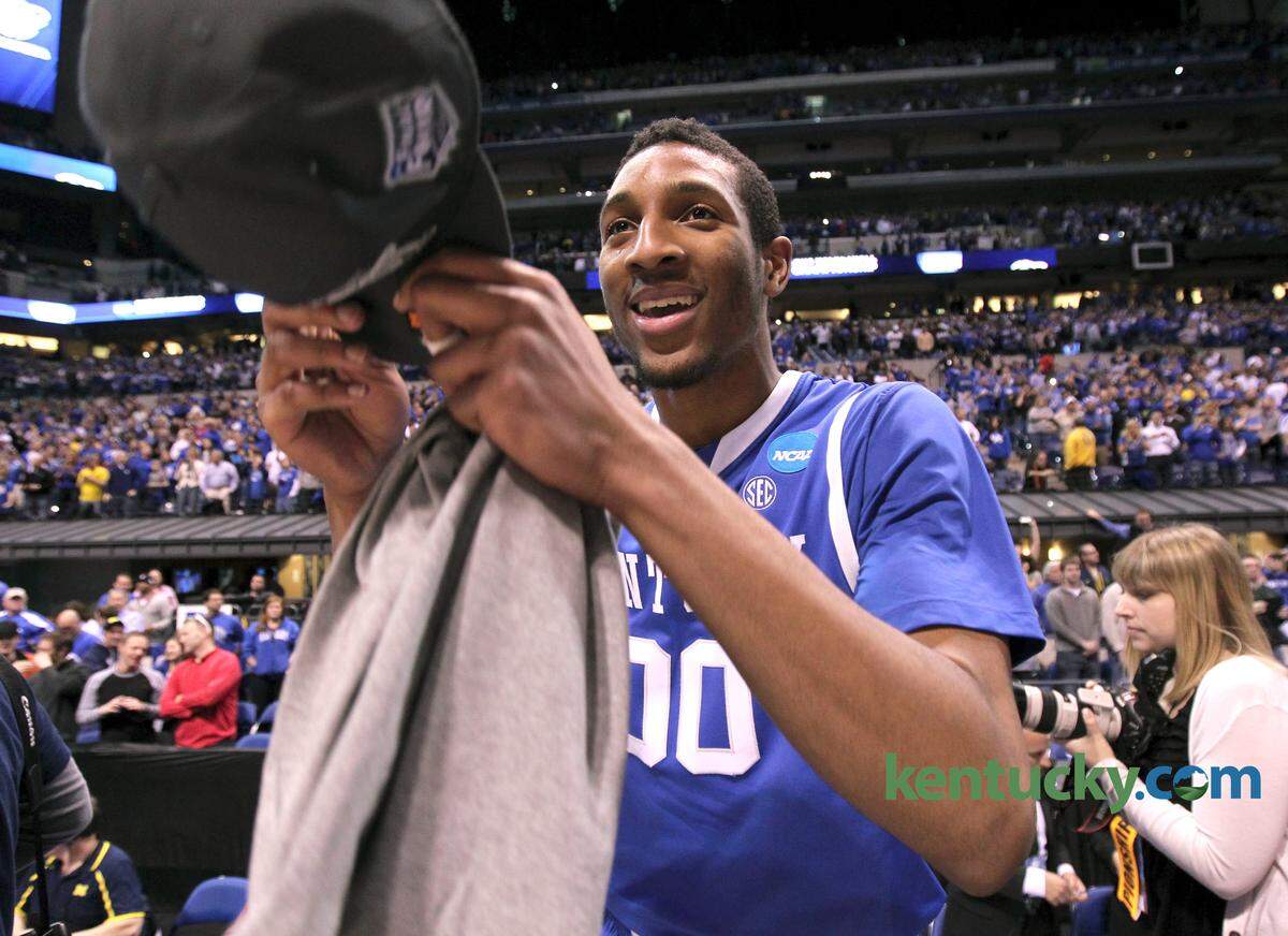 Kentucky forward Marcus Lee (00) celebrated after the Wildcats defeated Michigan 75-72 in the 2014 NCAA Tournament round of eight to advance to the Final Four.