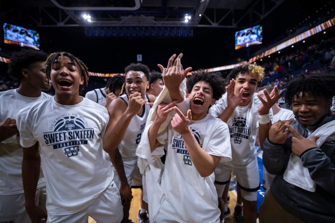Warren Central celebrate after winning the championship game against George Rogers Clark at the 2023 UK HealthCare Boys’ Sweet 16 state basketball tournament at Rupp Arena on March 19.