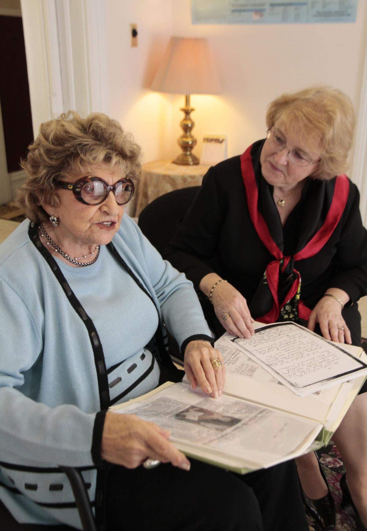 Irma Rosenstein, 89, left, who has been involved with the local Planned Parenthood organization since 1957, and state Planned Parenthood director Shirley Jones, right, whose office is in Louisville, looked at Rosenstein’s scrapbook on Wednesday, Sept. 21, 2011 at Bluegrass Health Center, local home of Planned Parenthood, in Lexington, Ky. Planned Parenthood of the Bluegrass turns 75 this year. A lot has happened since prominent women fought to allow reproductive freedom in Fayette County.