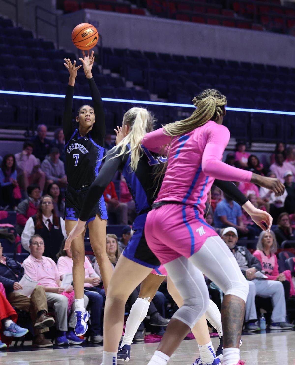 Starr Jacobs (7), one of three Ole Miss players to secure nine rebounds Monday night, boxes out Kentucky’s Clara Strack as the Wildcats’ Teonni Key puts up a shot. The Rebels claimed 27 offensive rebounds to UK’s four, and Jacobs collected a team-high seven of those.
