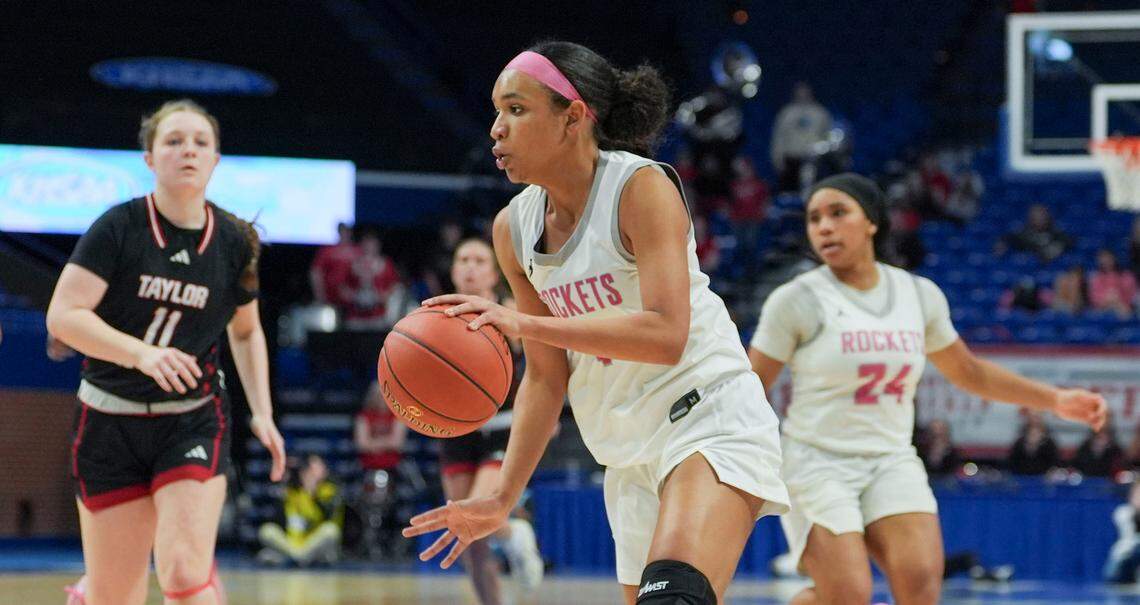 Assumption’s Jaida Allen dribbles upcourt against Taylor County during Clark’s Pump-N-Shop Girls’ Basketball Sweet 16 semifinals at Rupp Arena on Saturday.