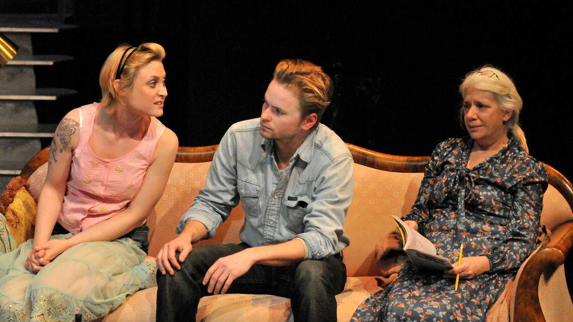 The Girl (Heather Porter) talks to Paul (Chris Owen) and Millie (Lyn Hungerford) in the lobby of the Hotel Baltimore. Project See Theatre presents Langford Wilson's 'The Hot l Baltimore," March 1-11 at the Downtown Art Center in Lexington, Ky. This picture was taken at a dress rehearsal Feb. 28, 2012. Photo by Rich Copley| Lexington Herald-Leader