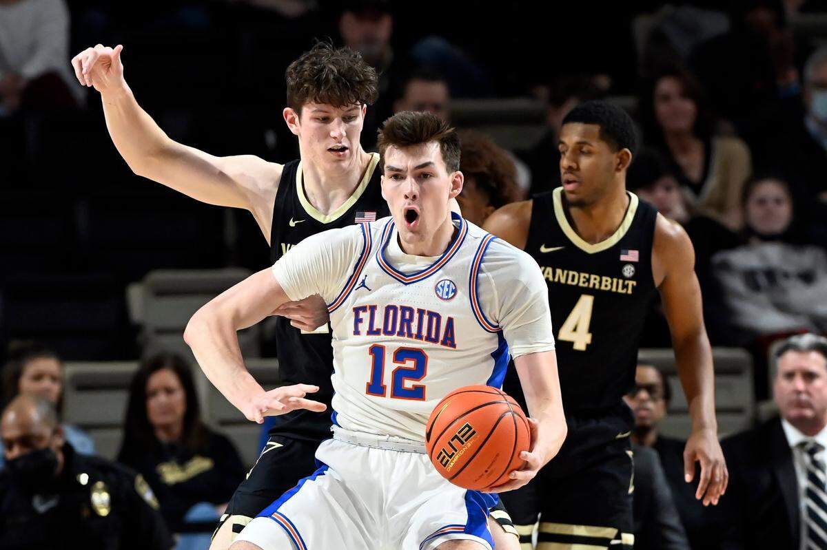Florida forward Colin Castleton (12) plays against Vanderbilt during the first half of an NCAA college basketball game Tuesday, March 1, 2022, in Nashville, Tenn. (AP Photo/Mark Zaleski)