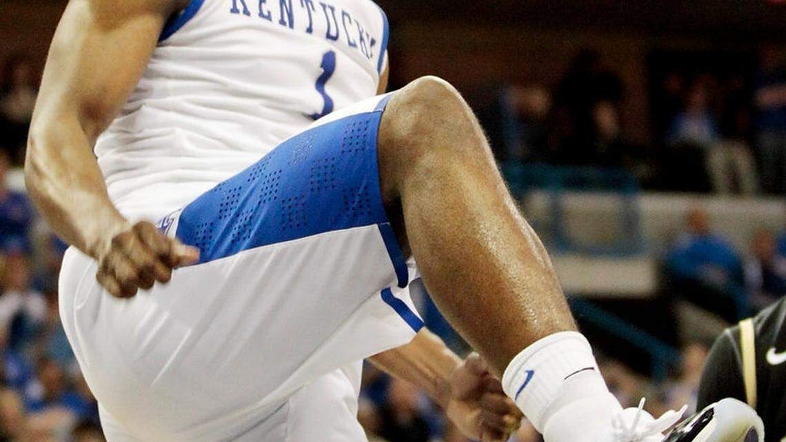 Kentucky's Darius Miller (1) reacted after he dunked in the second half of the SEC tournament championship game between Kentucky and Vanderbilt at New Orleans Arena in New Orleans, La.,, on March 11, 2012. Vanderbilt upset Kentucky 71-64  to capture the championship. Photo by Pablo Alcala | Staff