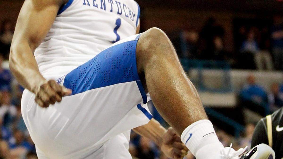 Kentucky's Darius Miller (1) reacted after he dunked in the second half of the SEC tournament championship game between Kentucky and Vanderbilt at New Orleans Arena in New Orleans, La.,, on March 11, 2012. Vanderbilt upset Kentucky 71-64  to capture the championship. Photo by Pablo Alcala | Staff