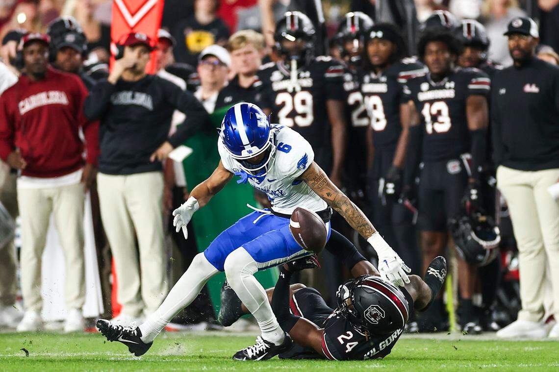Kentucky wide receiver Dane Key fumbles against South Carolina’s Jalon Kilgore last season. The Wildcats committed 20 turnovers and forced 18 in 2023.