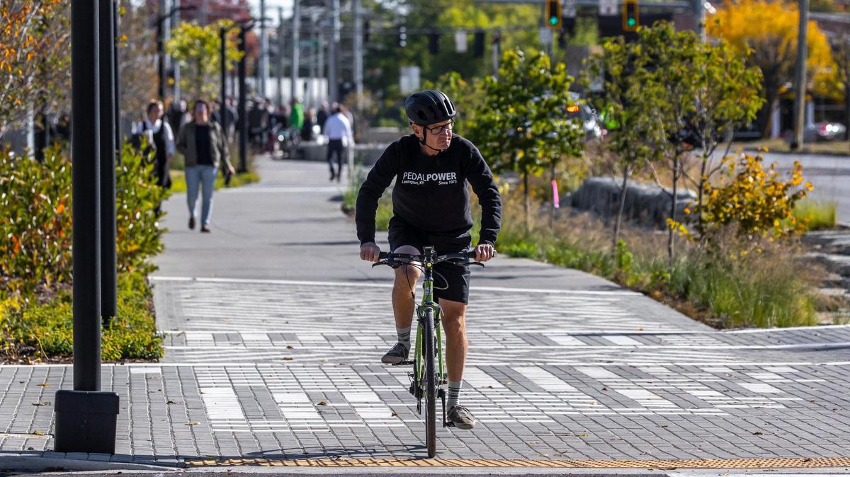 Howard Florence rode his bicycle along the Town Branch Commons trail near Midland Avenue in Lexington.