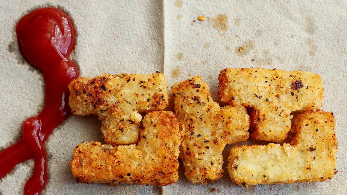 DV8 Kitchen co-owner Rob Perez says diners will often take their order of tater tots, lay them out on a napkin and play with the puzzle-shaped pieces.