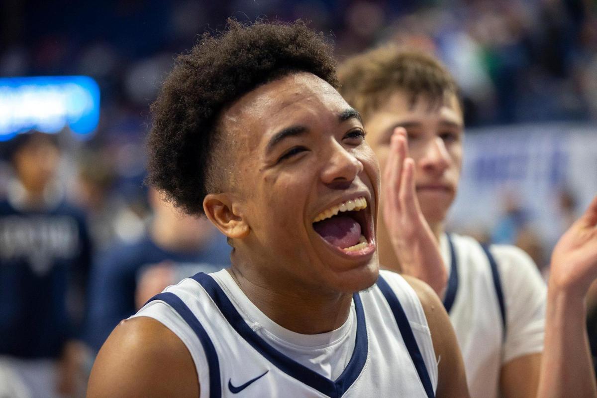 Warren Central’s Damarion Walkup (0) reacts after Warren Central defeated Male in overtime Thursday.