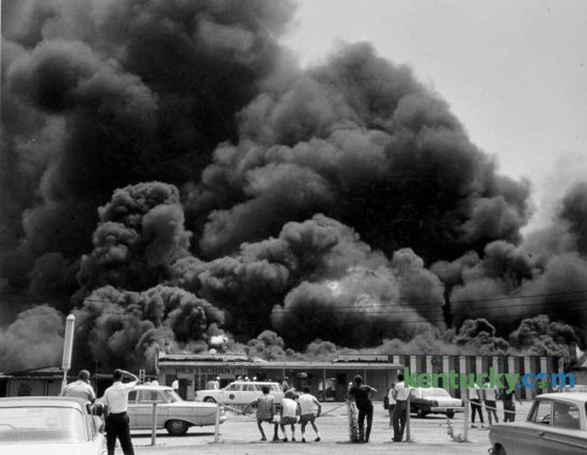 Fire destroyed the Joyland Casino and other buildings at what had been Joyland Park on Lexington’s north side in June 1965. The park had closed in 1964, and the casino was not rebuilt. Joyland Casino was not a place for gambling, which was illegal, but a gathering place for social events and dances. Mary Todd Elementary School and Joyland Bowling alley were built on the site of the park. Published in the Lexington Leader on June 21, 1965.