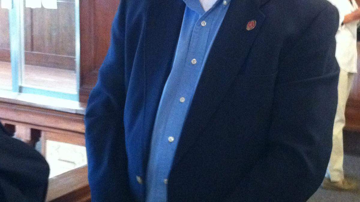 Robert Hendricks waited outside council chambers July 13, 2011, while the Lexington Police and Fire pension board met in closed session.