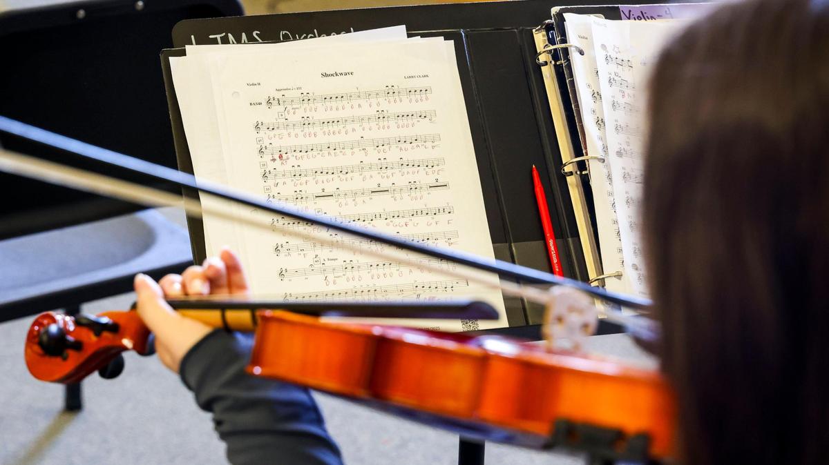 A Lexington Traditional Magnet School student plays during orchestra class, Tuesday March 4, 2025 in Lexington, Ky. The approximately 300 students in the school are enrolled in the Visual and Performing Arts Hub or Pathways program using arts to prepare students for high school.