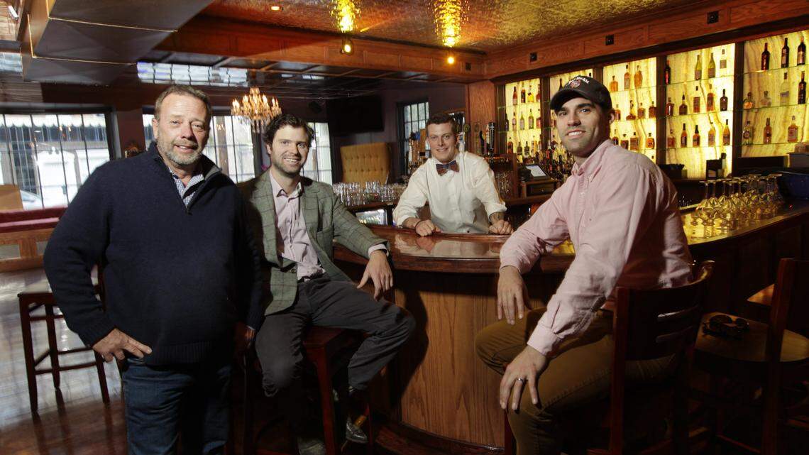 Hampton Fisher tended the bar for Belle's Cocktail House co-owners, from left, Larry Redmon, Justin Thompson, and Bob Eidson at Belle's Cocktail House.    