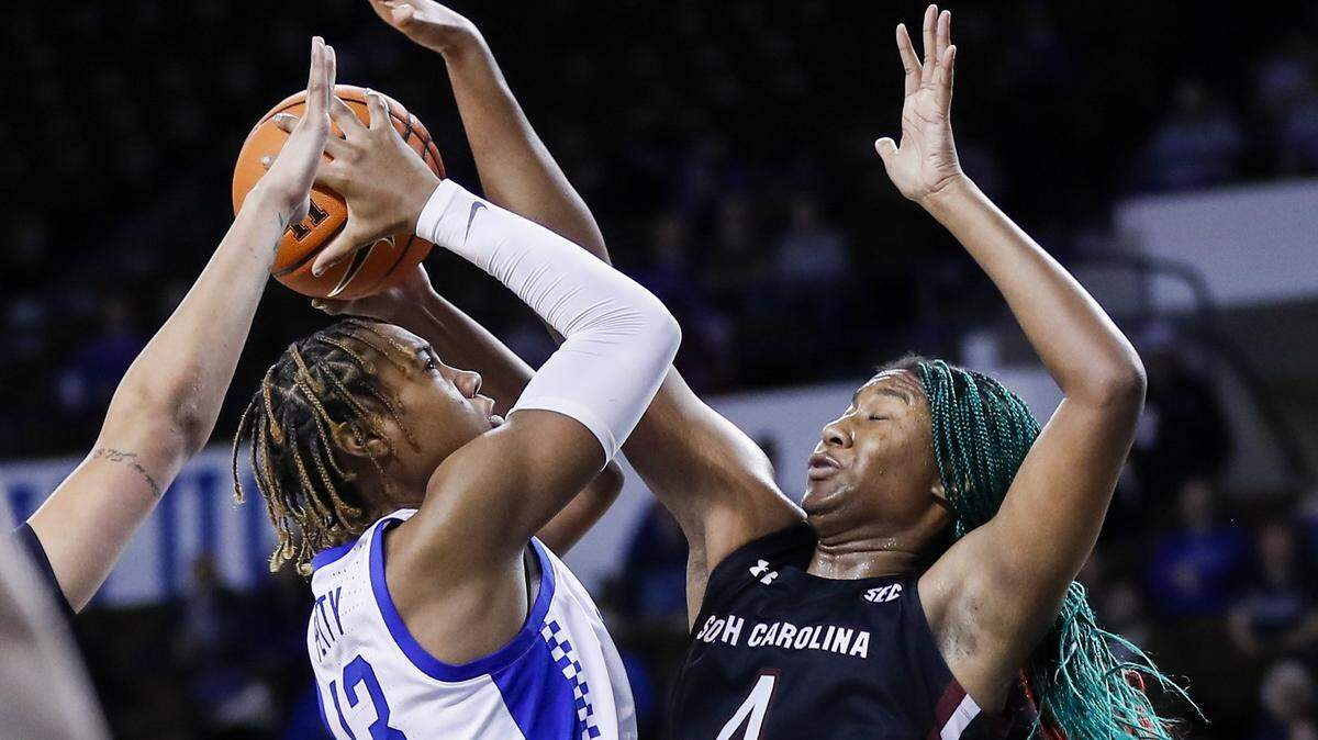 Kentucky forward Ajae Petty (13) drove to the basket against South Carolina’s Aliyah Boston when the teams met last month in Memorial Coliseum. UK’s frontcourt will be counted on to hold up its end when the Wildcats visit the No. 1 Gamecocks on Thursday night.
