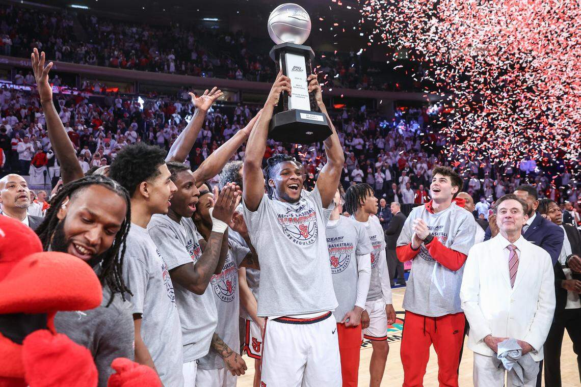 St. John's big man Zuby Ejiofor (24) hels the trophy after the Red Storm won the 2024-25 Big East regular season championship. The 6-foot-9, 245-pound Ejiofor is the only returning starter from that team.