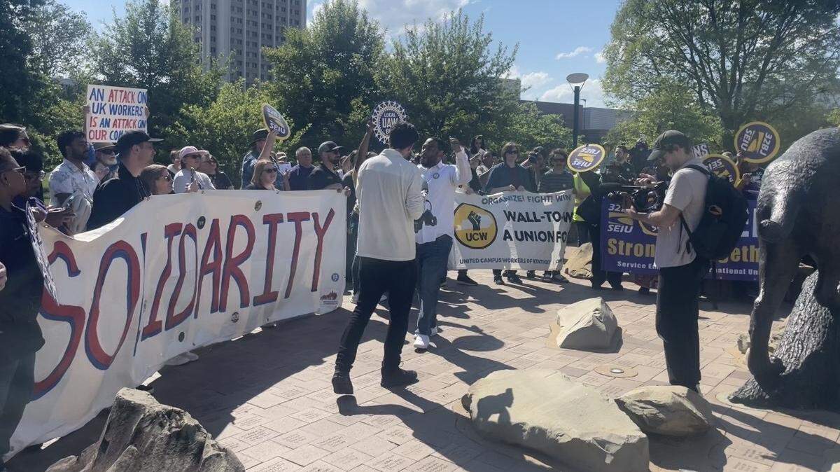 Members of the United Campus Workers of Kentucky and Service Employees International Union protested the centralization of workers at the University of Kentucky Monday, May 5, 2026. Former Kentucky House Rep. Charles Booker, a union advocate running to succeed retiring Kentucky Sen. Mitch McConnell, led a group of union workers in chant.