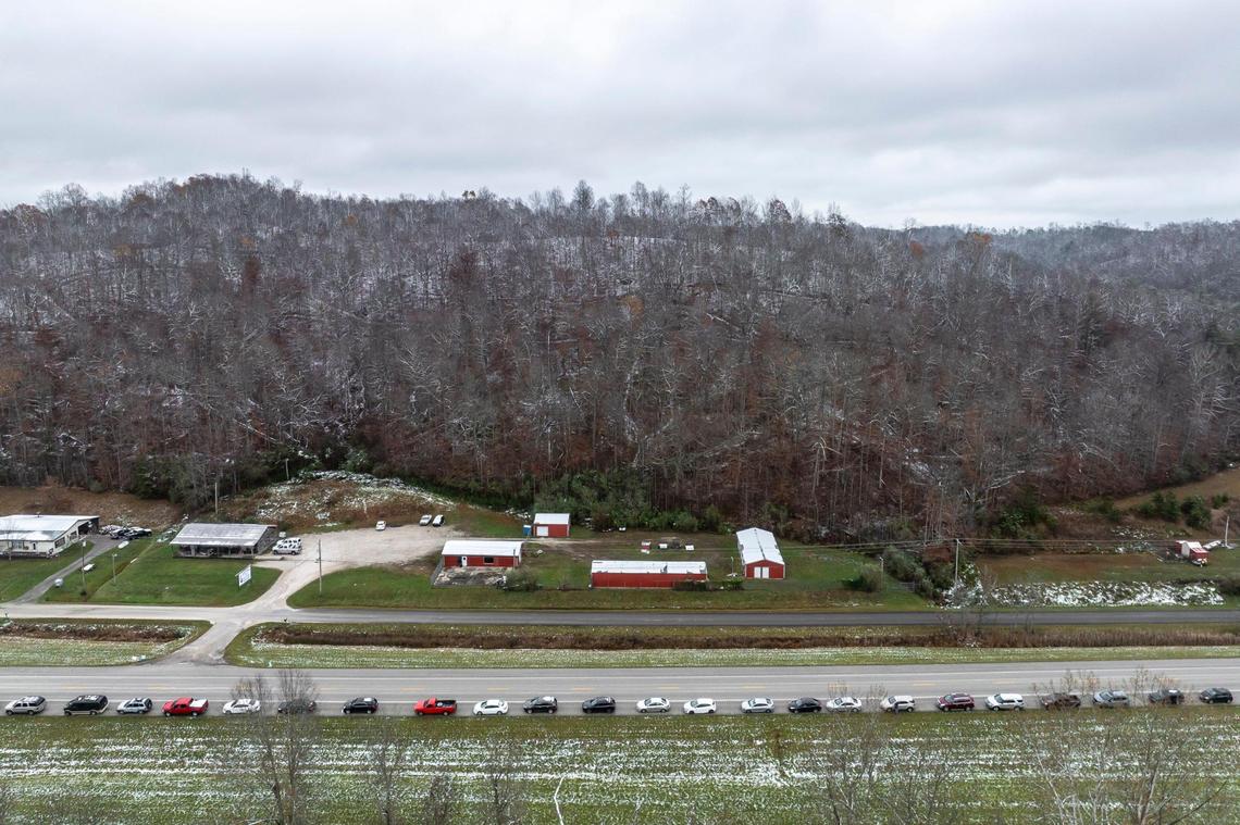 Cars stretch two miles down the road on a distribution day at the Hazel Green Food Project in Hazel Green, Ky., on Friday, Nov. 22, 2024.