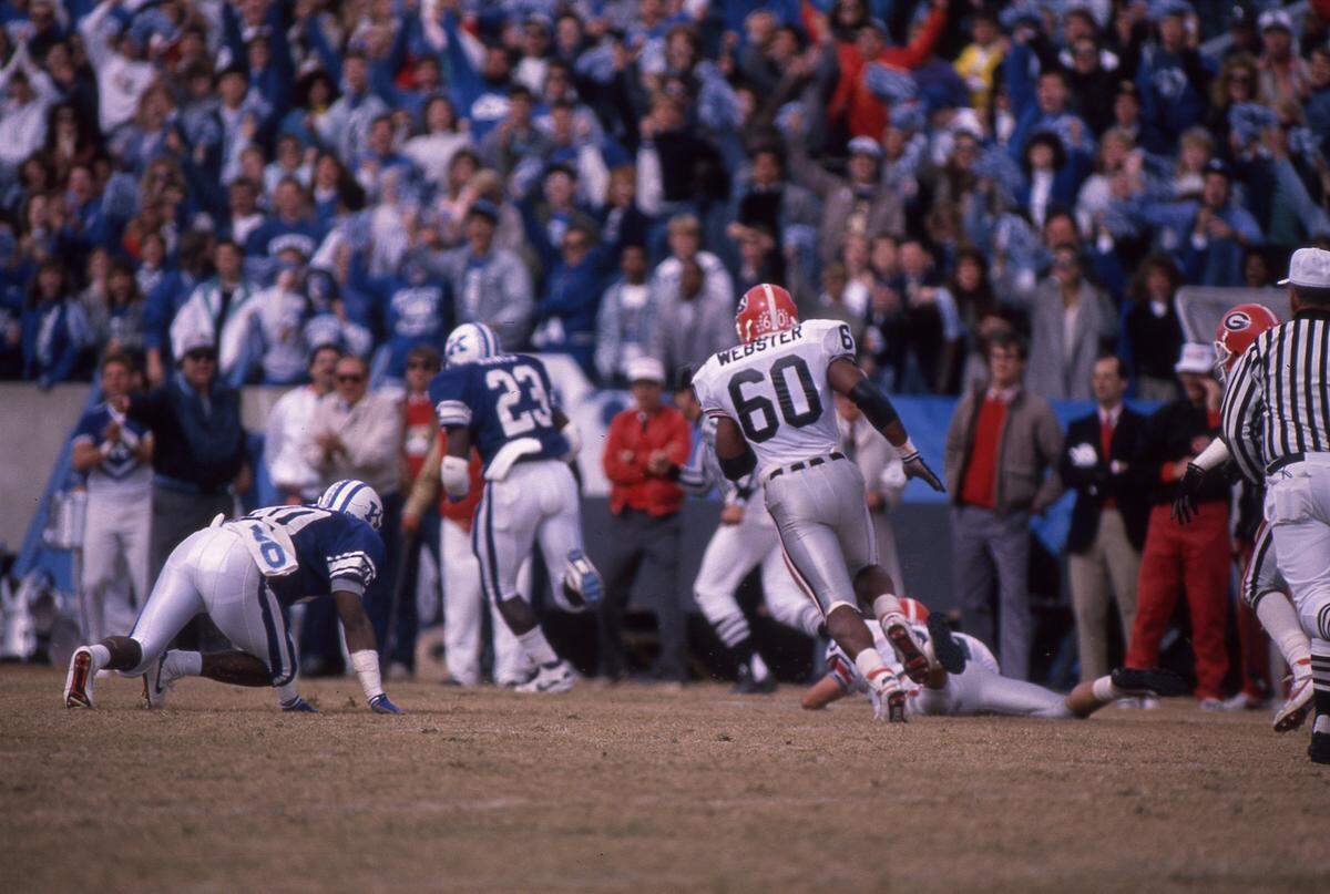 Kentucky's Alfred Rawls (23) on what became the game-winning touchdown run in UK's 16-10 upset of No. 11 Georgia in 1988.