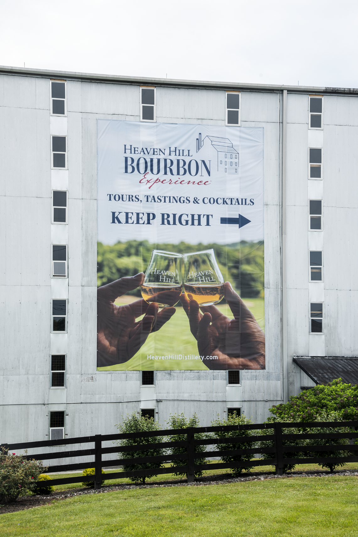 A new sign directs Bardstown visitors to the Heaven Hill Bourbon Experience. You can sign up for tours online. Bourbon tourism took a big hit in 2020 but Kentucky distilleries are hoping to rebound.