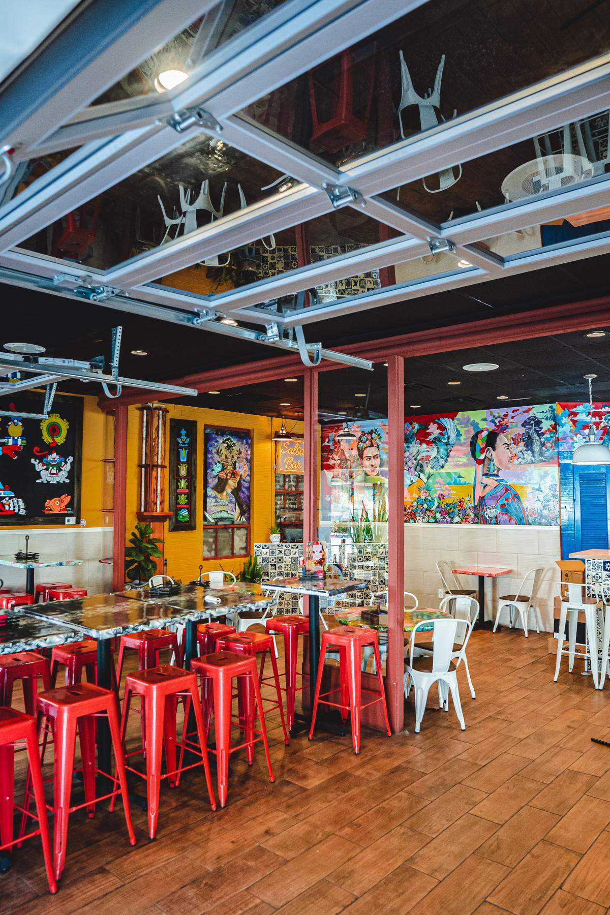 Inside La Taquiza, the new Mexican restaurant on East Main Street where Sav’s used to be. The original windows of the building built as a gas station are inside the garage doors, which were added when it was converted into a restaurant.