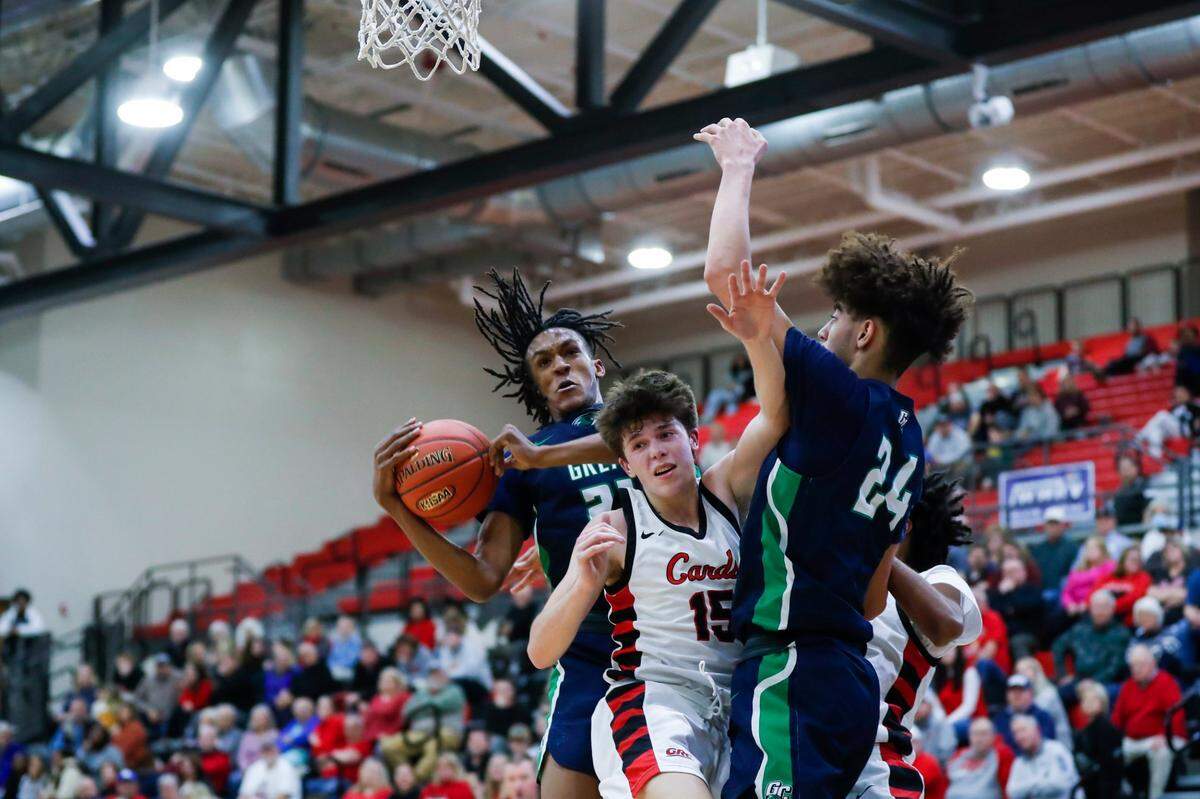 Great Crossing power forward Jeremiah Godfrey grabs a rebound against George Rogers Clark High School in Winchester on Jan. 5, 2023.