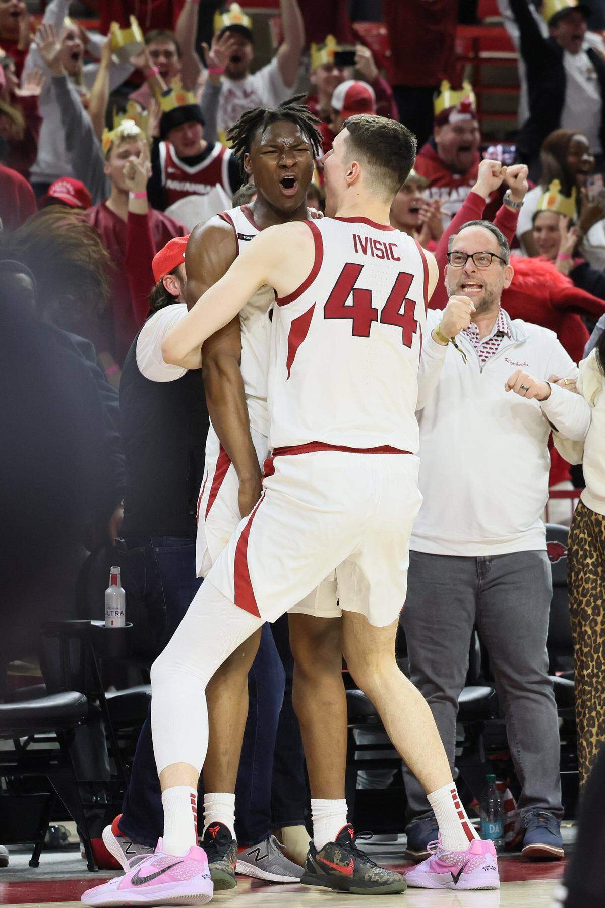 Arkansas forward Adou Thiero celebrates with Zvonimir Ivisic after the Razorbacks’ win over Georgia this month.