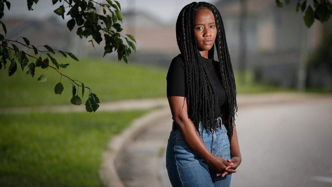 Micheline Karenga, 17, of Lexington, Ky., stands in her neighborhood in Lexington, Wednesday, July 21, 2021. Karenga recently graduated from Lafayette High School where she helped start a group called Counselors Over Cops which aims to address the root causes of misbehavior and end what she calls the school-to-prison pipeline.