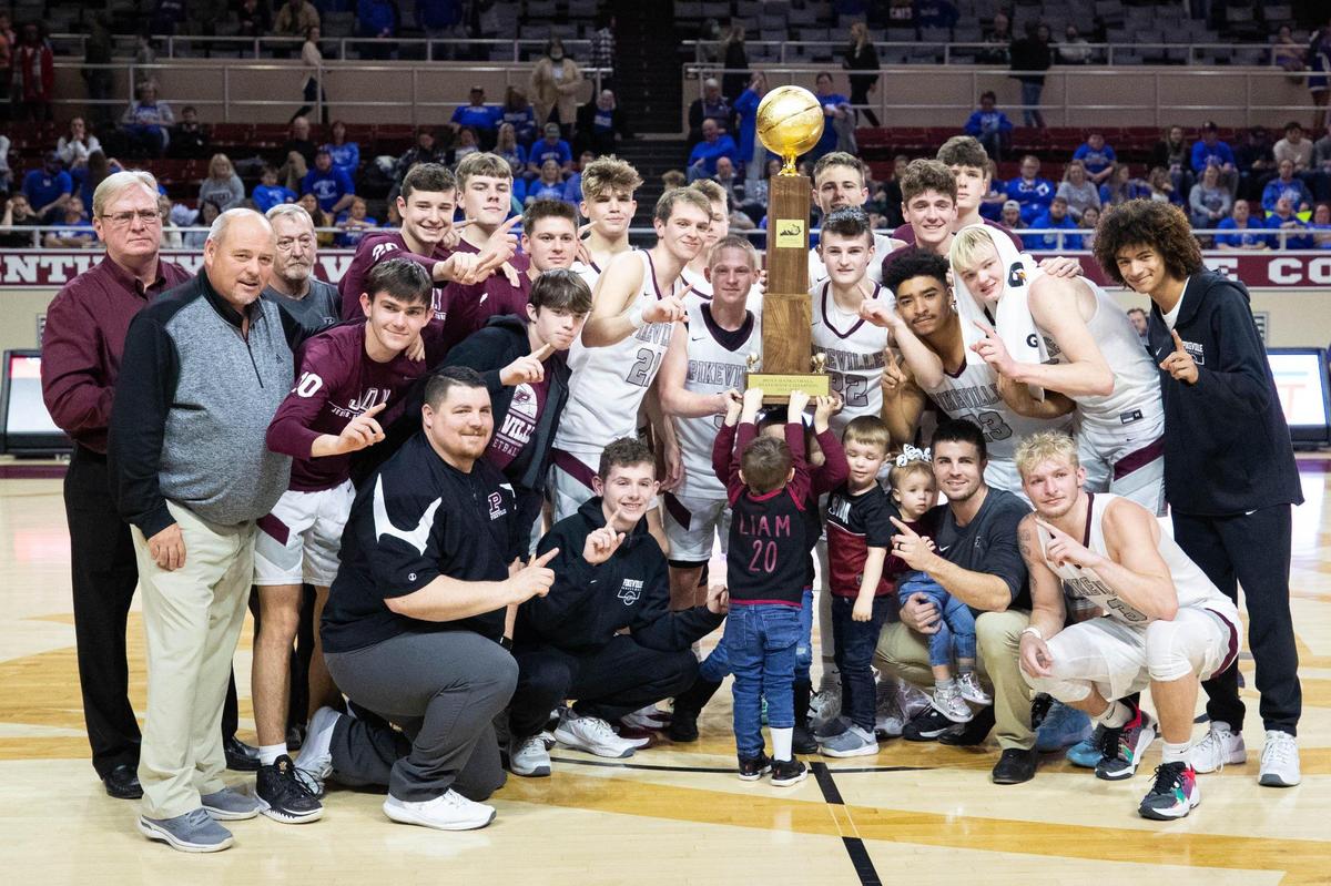 Pikeville poses with its championship trophy after winning the boys’ All “A” Classic at EKU’s McBrayer Arena in Richmond on Sunday.