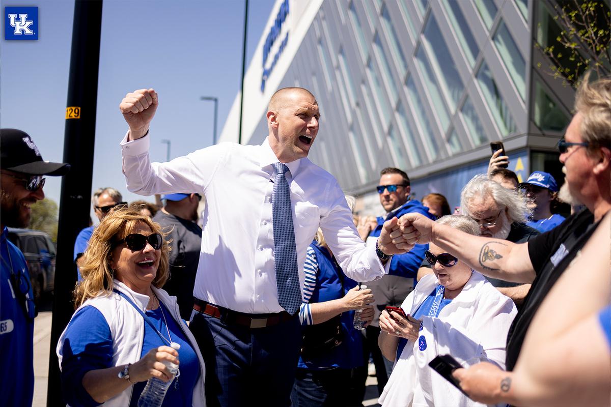 New Kentucky men’s basketball coach Mark Pope mingles with fans waiting in line outside Rupp Arena on Sunday afternoon before heading inside for his introductory press conference.