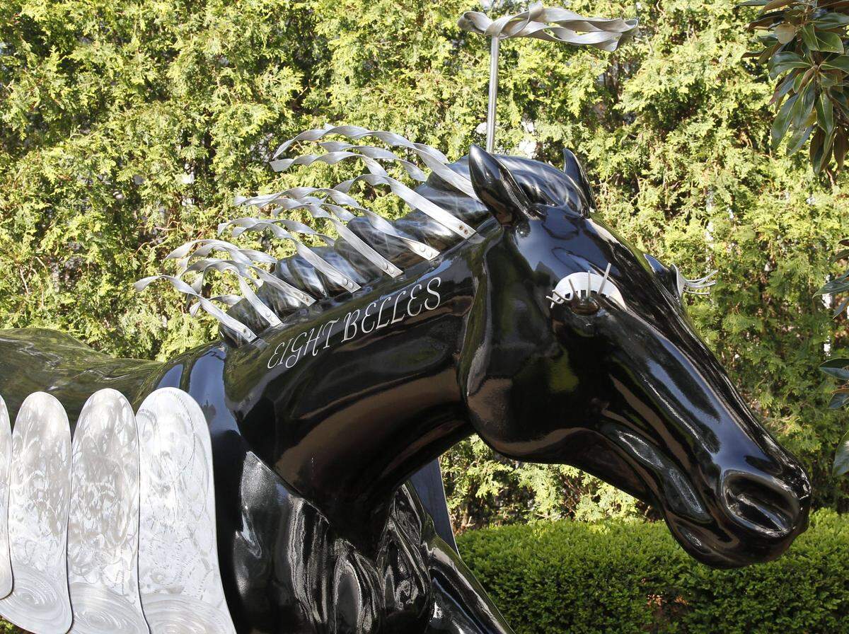 A statue of Eight Belles, who died on the racetrack after the 2008 Kentucky Derby, stands behind the Derby Museum in Louisville.