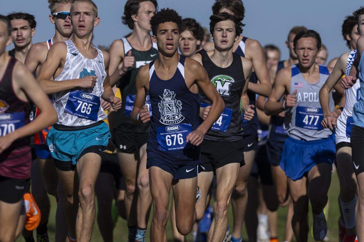 Lafayette’s Xavier Richardson (676) runs during the Class 3A boys state cross country championships at the Kentucky Horse Park on Saturday. The Generals won the team title.