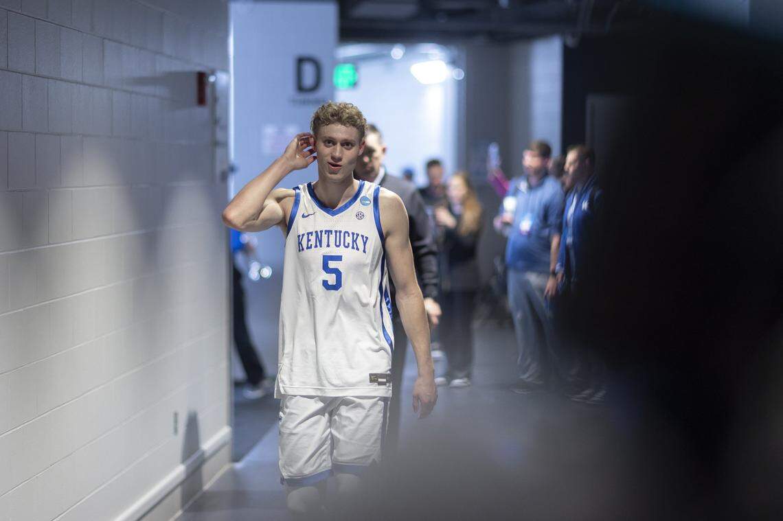 Kentucky guard Collin Chandler walks to the locker room following Friday’s victory against Troy in the first round of the NCAA Tournament at Fiserv Forum in Milwaukee.