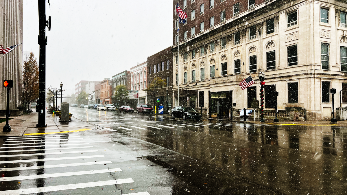 Snowfall gradually increased as commuters drove cautiously downtown Lexington early Thursday morning, as parts of Kentucky received the first snowfall of the season on November 12, 2024, in Lexington, Ky.