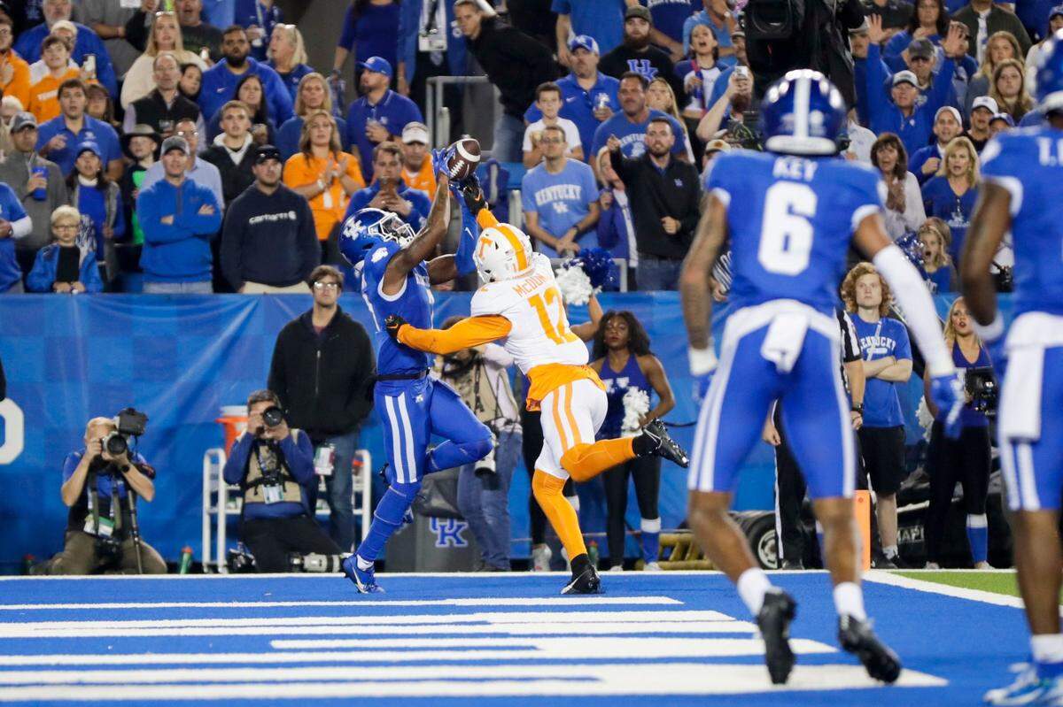 Kentucky wide receiver Barion Brown (7) catches a pass to score a touchdown against Tennessee during Saturday's game at Kroger Field.