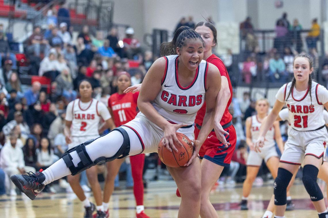 George Rogers Clark’s Ciara Byars (3) grabs a rebound against Sacred Heart during their game at GRC Arena in Winchester on Feb. 12.
